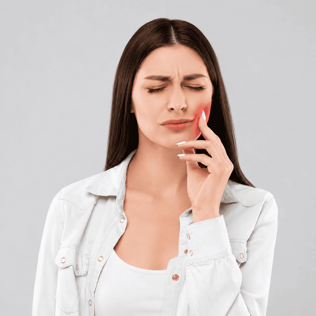 Patient experiencing severe jaw pain before dental treatment at Dr. Pawar's Advanced Dentistry in Thane West