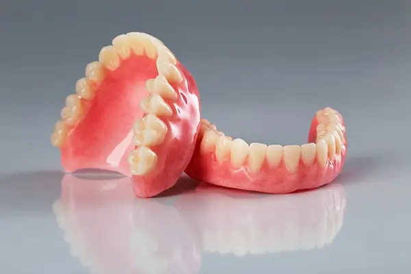 Full set of custom upper and lower dentures at Dr. Pawar's Advanced Dentistry in Thane West